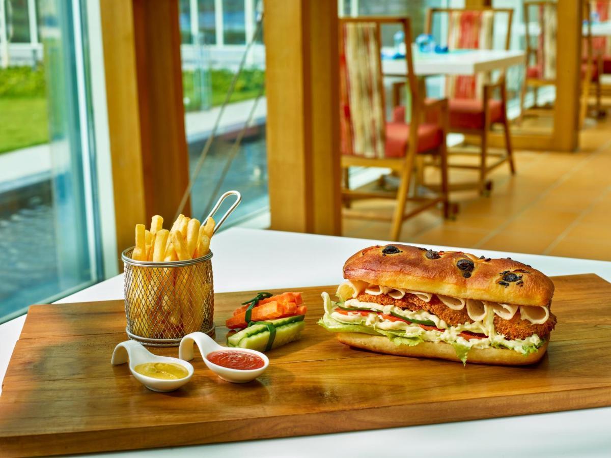 O By Tamara, Trivandrum 特里凡得琅 外观 照片 A chicken sub
