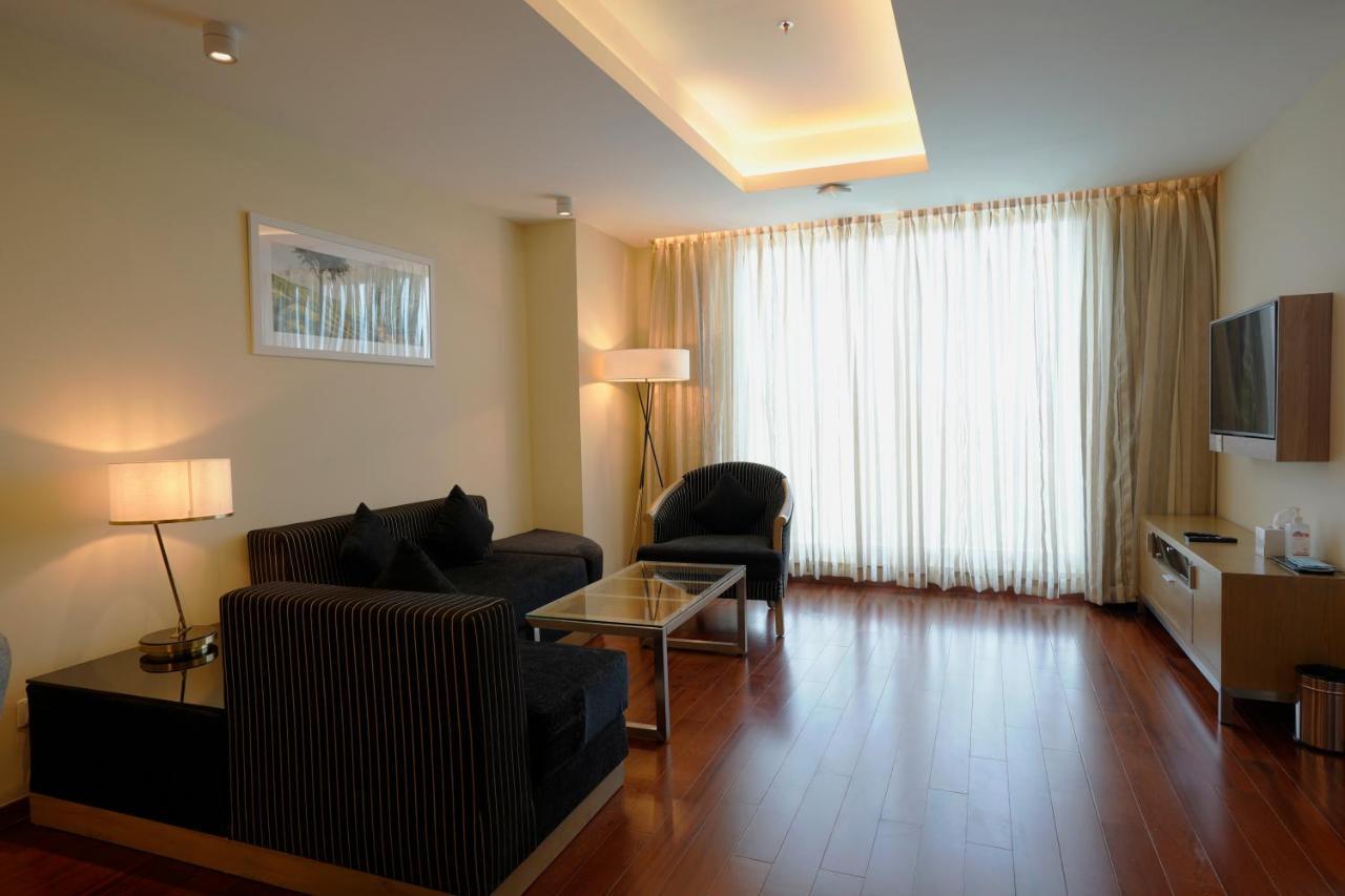 O By Tamara, Trivandrum 特里凡得琅 外观 照片 Living room
